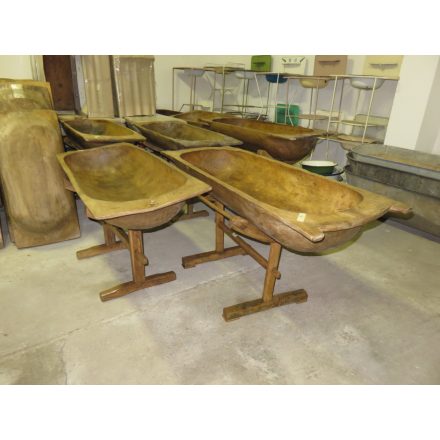 Antique dough bowls on stand